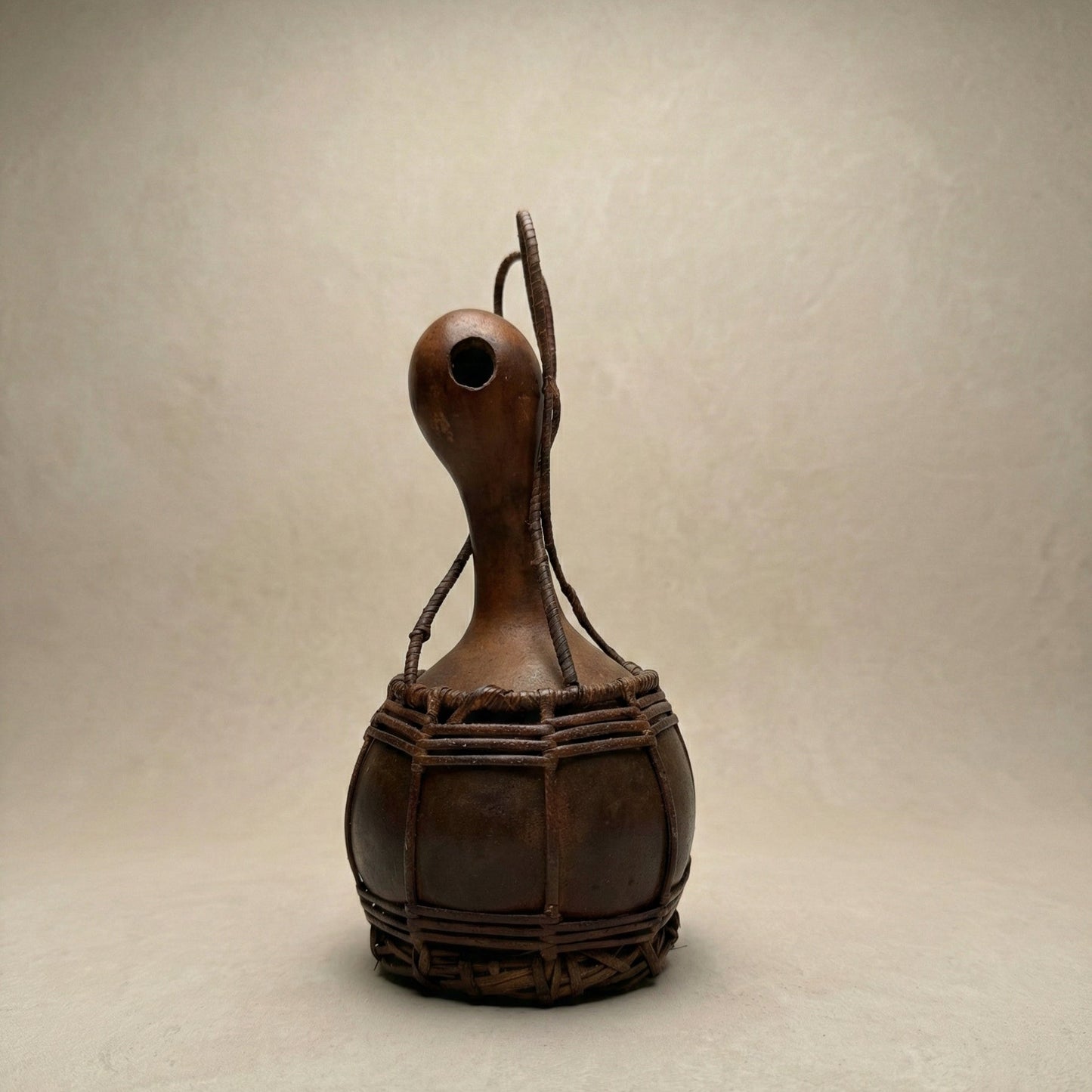 The A·chik Vessel displayed alongside other objects showing scale and natural form