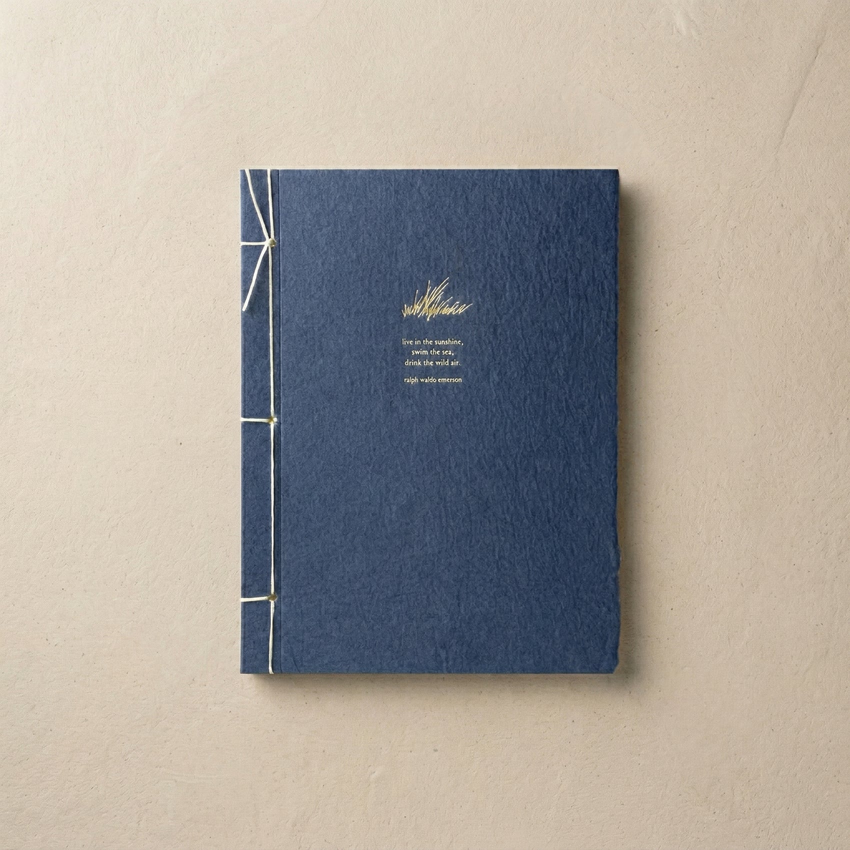 Ralph Waldo Emerson Inspiration Journal in denim blue recycled cotton with champagne foil grass motif and Japanese stab binding