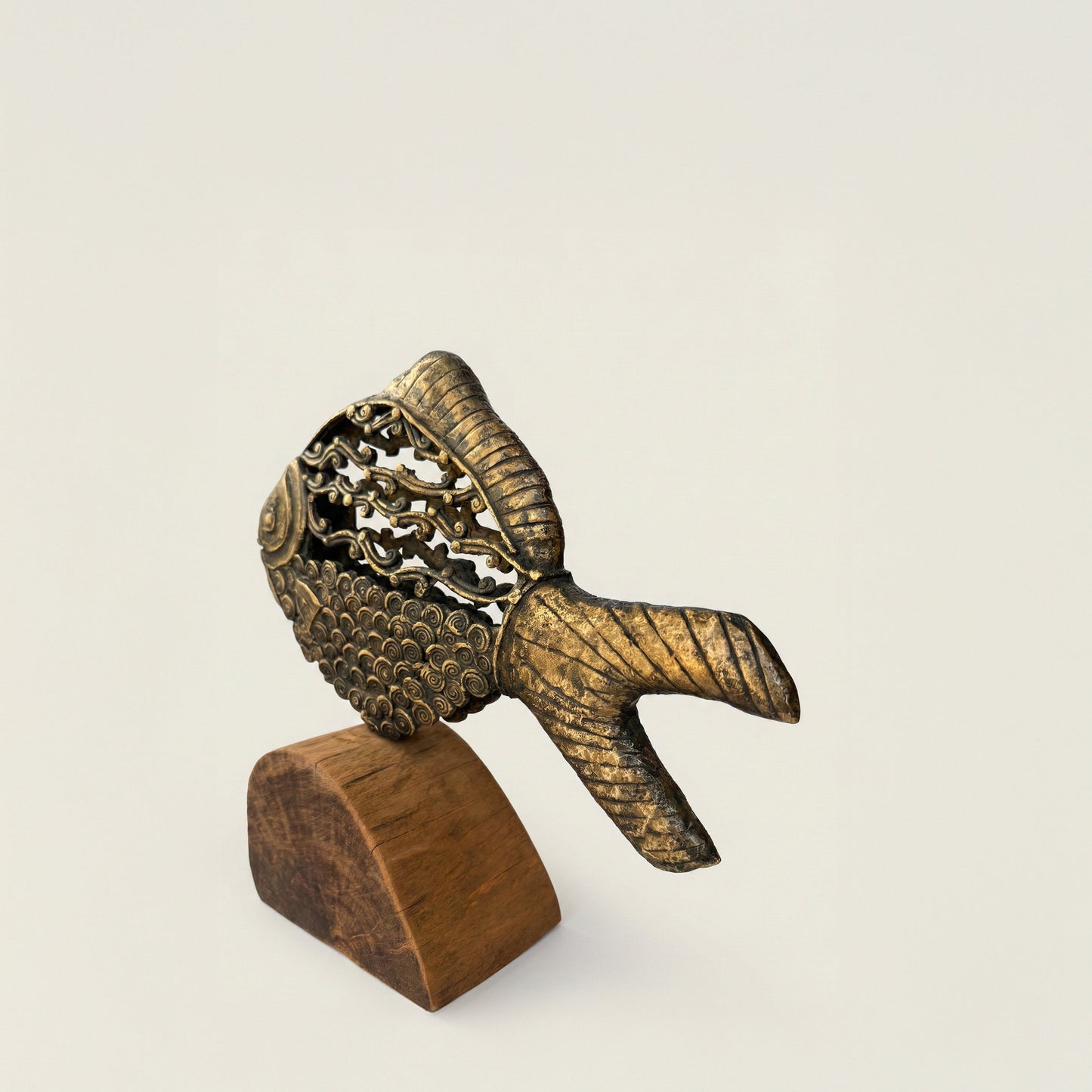 Close-up detail of The Eternal Current showing Dhokra lost-wax cast metal texture and organic perforations