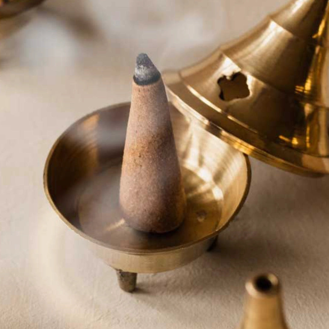 Nag Champa hand-rolled cone incense in natural warm tones, made with Champa flower fragrance, from WILLAGE