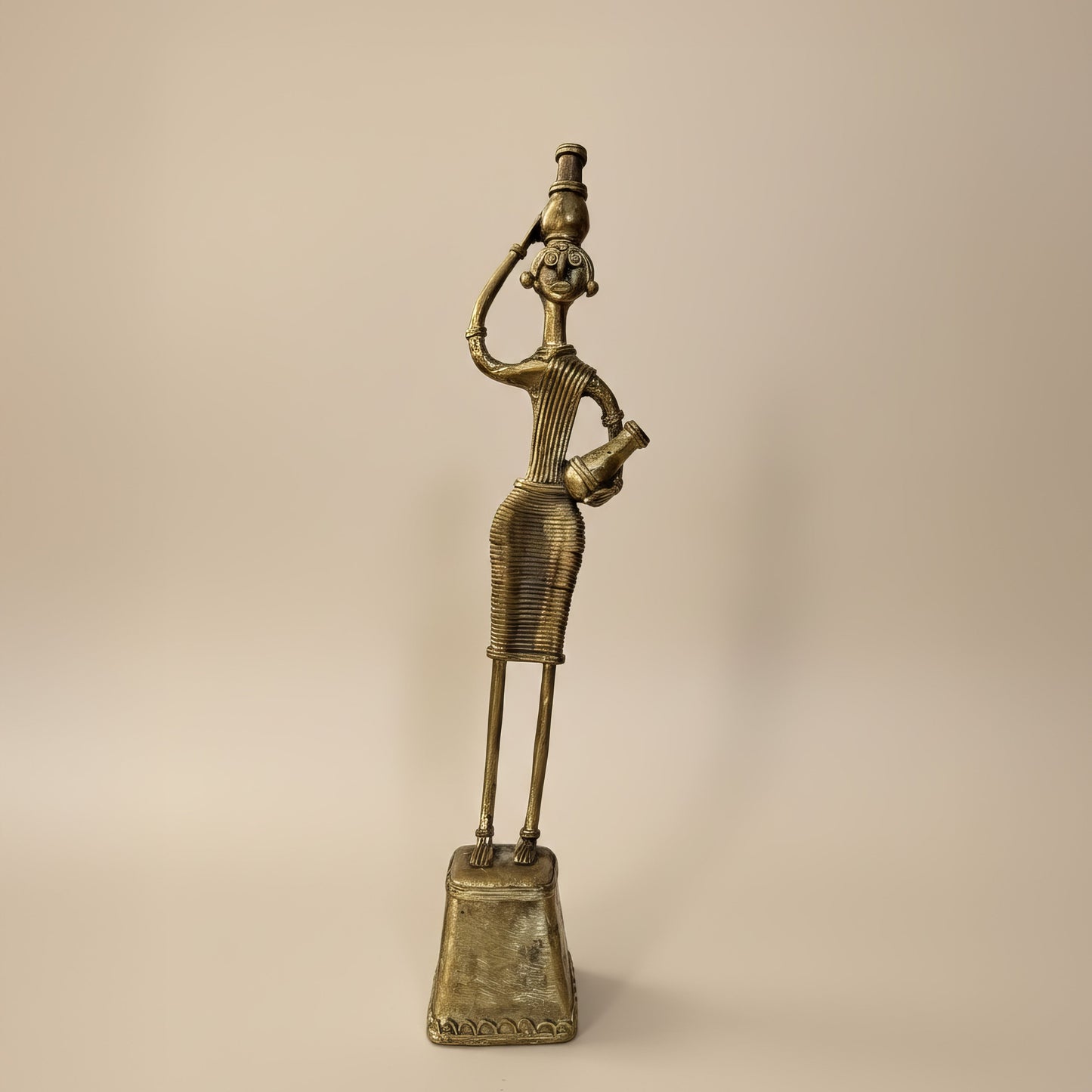 The Water Bearer — A Dhokra Reverie