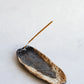 Volcanic Echo incense tray by Laima Ceramics on dark background