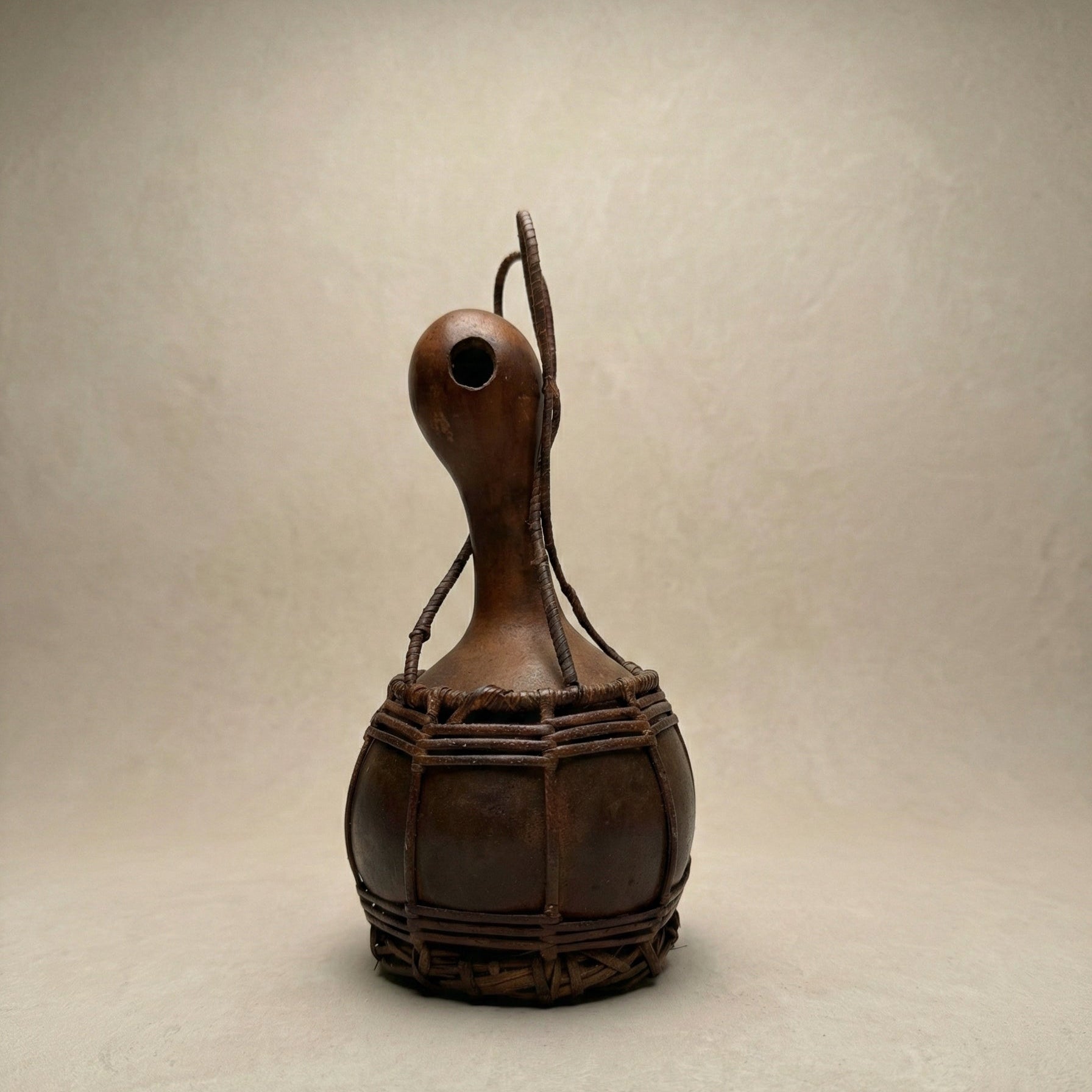 The A·chik Vessel displayed alongside other objects showing scale and natural form