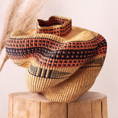 Bolgawoven sculpture basket in brown and black geometric pattern, handwoven from naturally dyed elephant grass by Nanasei Agyemang in Ghana, from WILLAGE