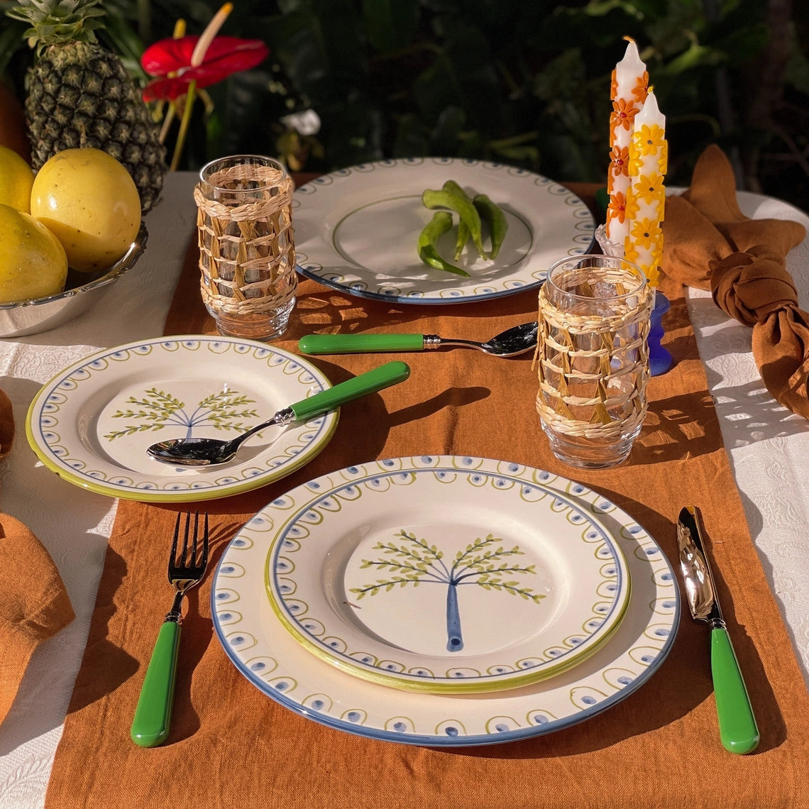 Ceramic dinner plate with hand-painted coconut and dot pattern rim, handcrafted in Portugal by Raquel Souza