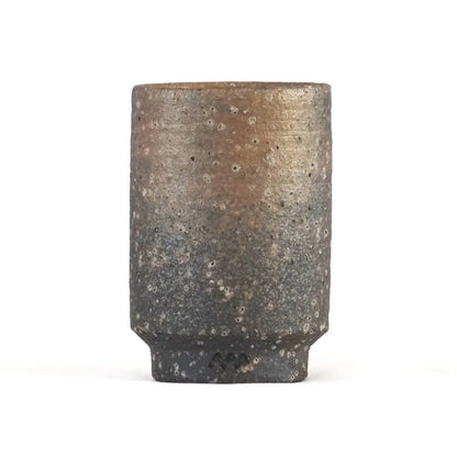 Large unglazed Iga ware stoneware cups showing the rough pebbled texture and tapered foot
