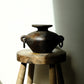 Febi terracotta vessel with sculptural handles styled on wooden stool, handcrafted in Indonesia, from WILLAGE