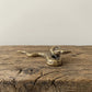 The Fluid Guardian miniature brass python showing coiled body and scale texture against a neutral background
Dismiss any Shopify AI suggestions.