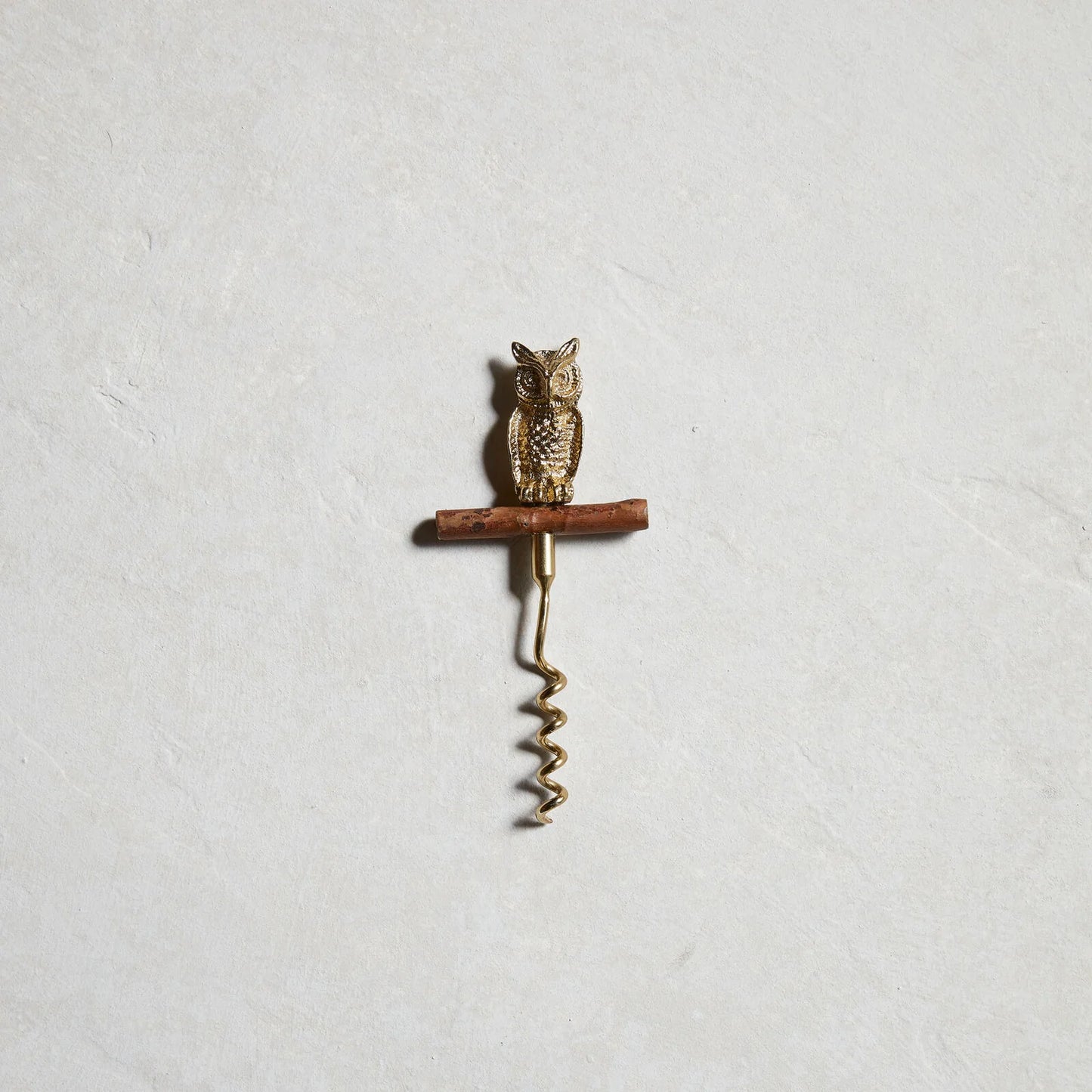 The Gilded Corkscrew from the Whimsy Bar collection with owl figure on branch-like handle, cast in gold-finished aluminum, from WILLAGE