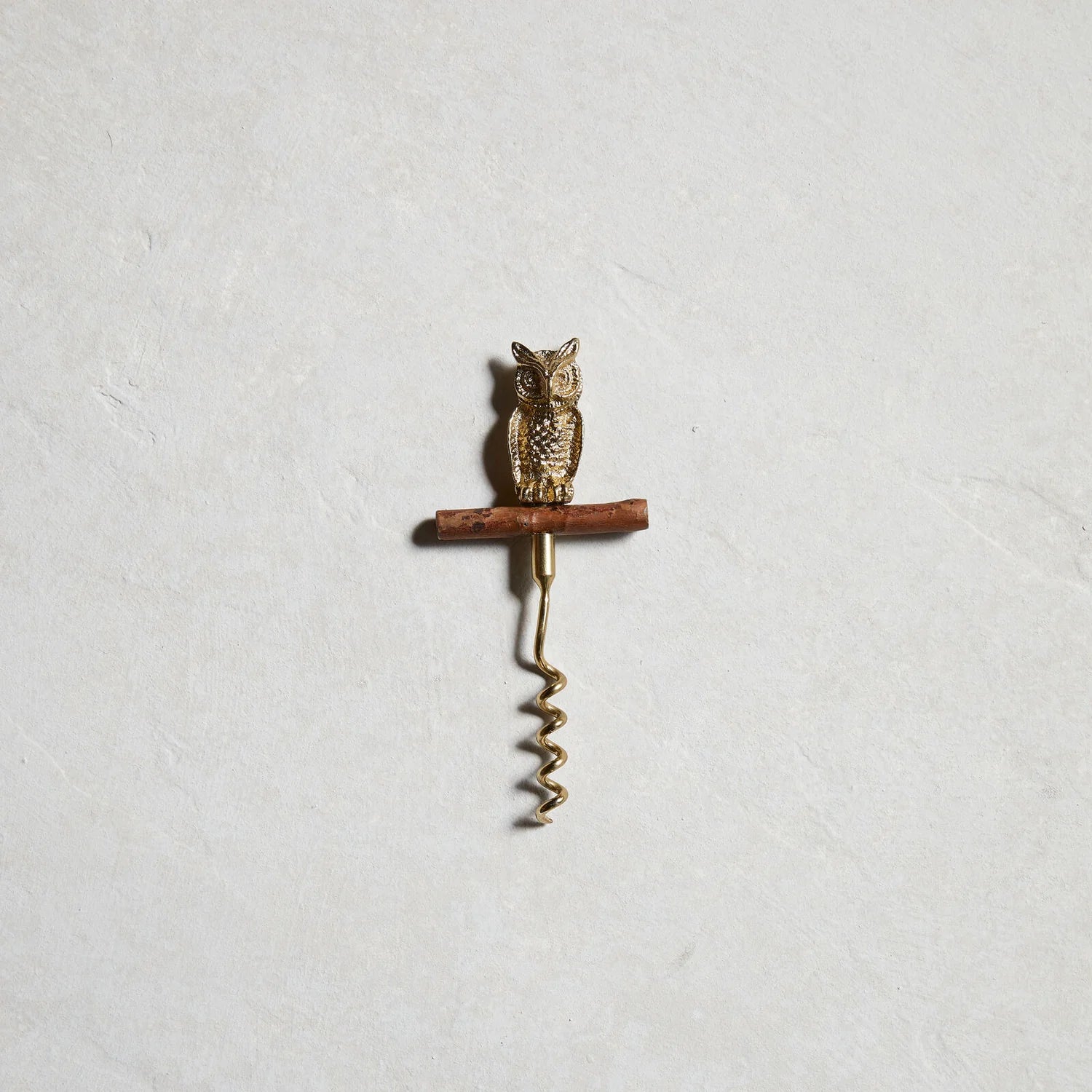 The Gilded Corkscrew from the Whimsy Bar collection with owl figure on branch-like handle, cast in gold-finished aluminum, from WILLAGE