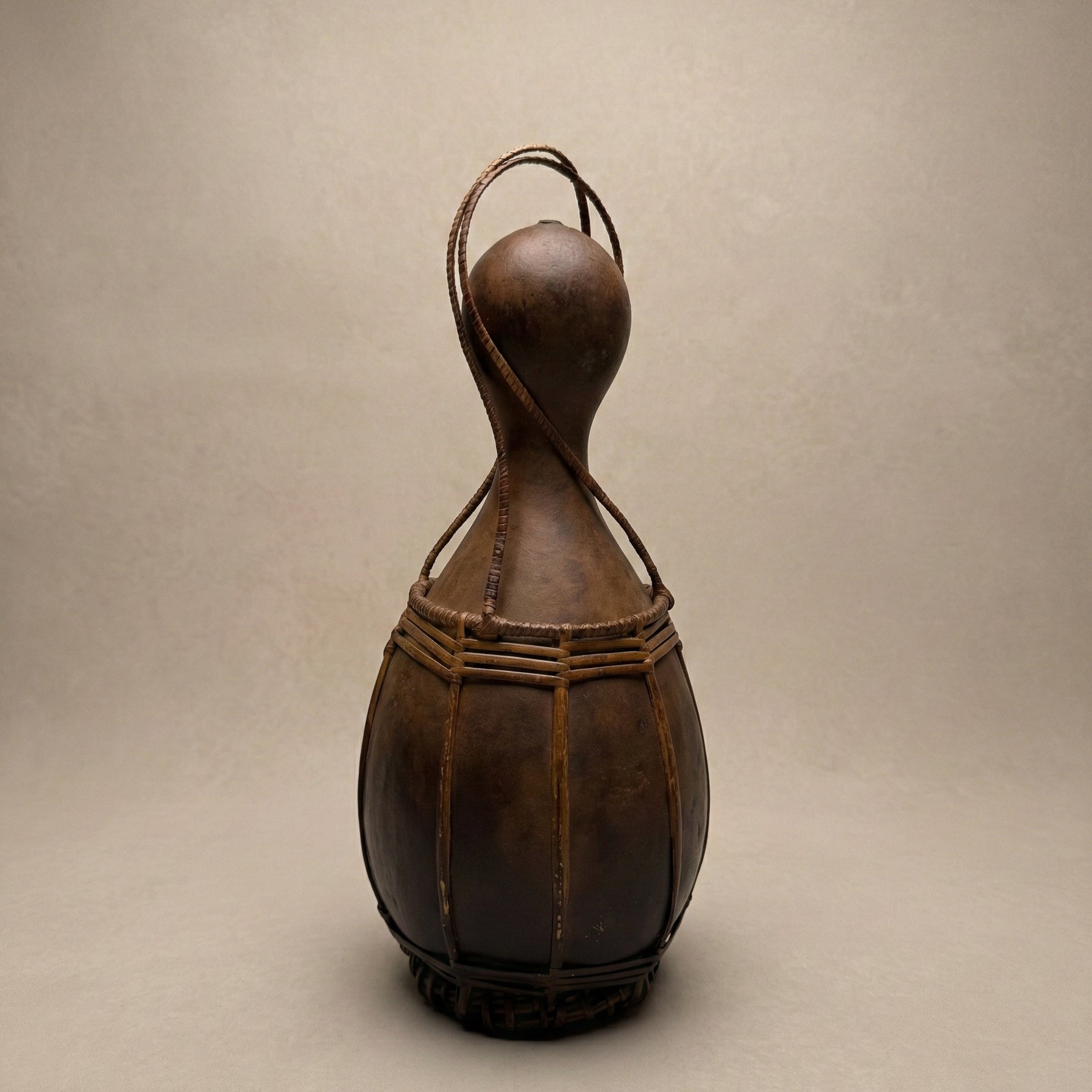 The Grand A·chik Canteen forest gourd vessel with hand-split rattan and cane bindings, from the Garo Hills of Meghalaya India, from WILLAGE