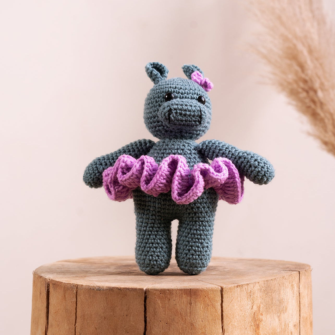 Hand-crocheted hippo amigurumi in pink tutu, showing yarn detail and hand-stitched finish, from The Hobbyt India