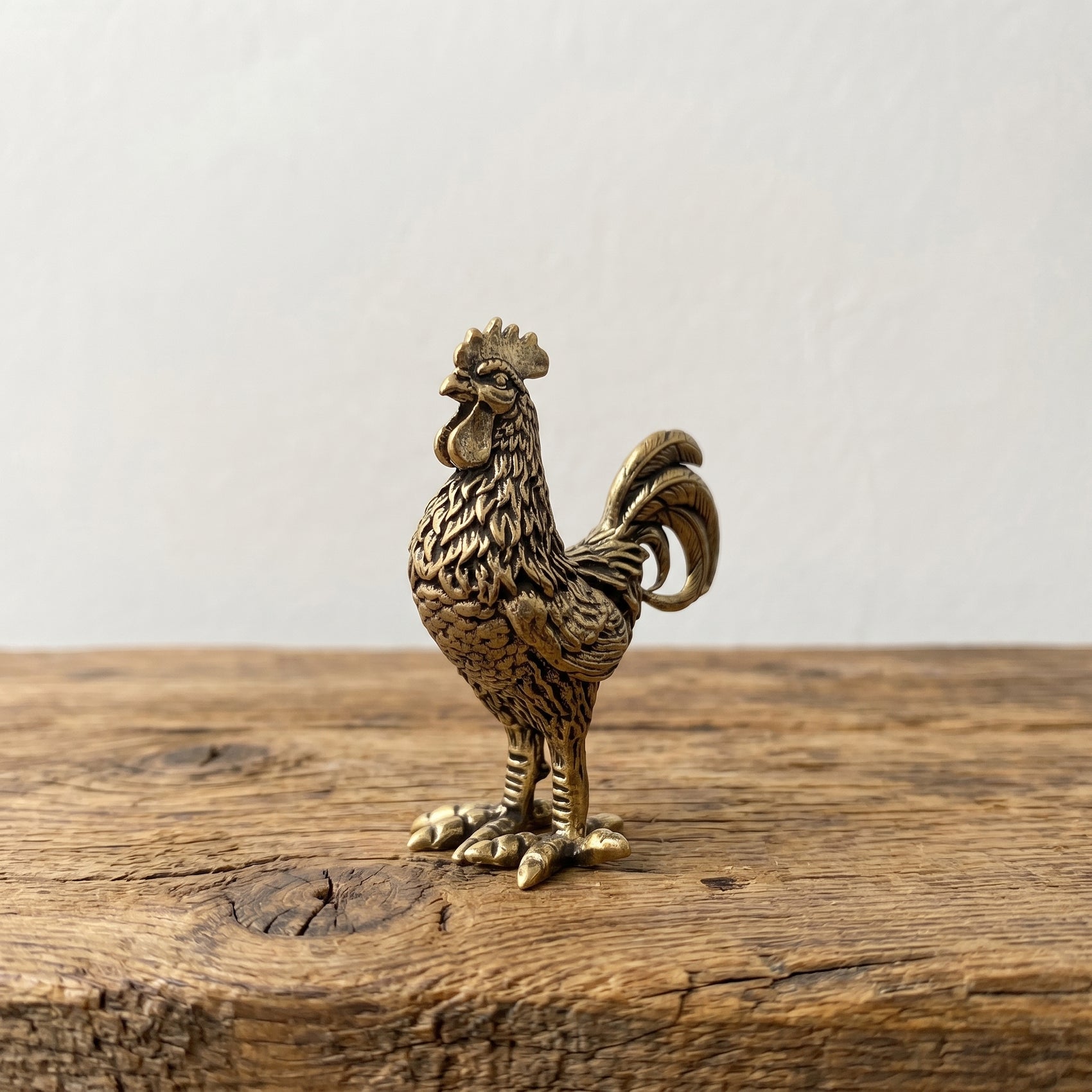 The Herald miniature solid brass rooster figurine with finely detailed feathers and aged antique patina