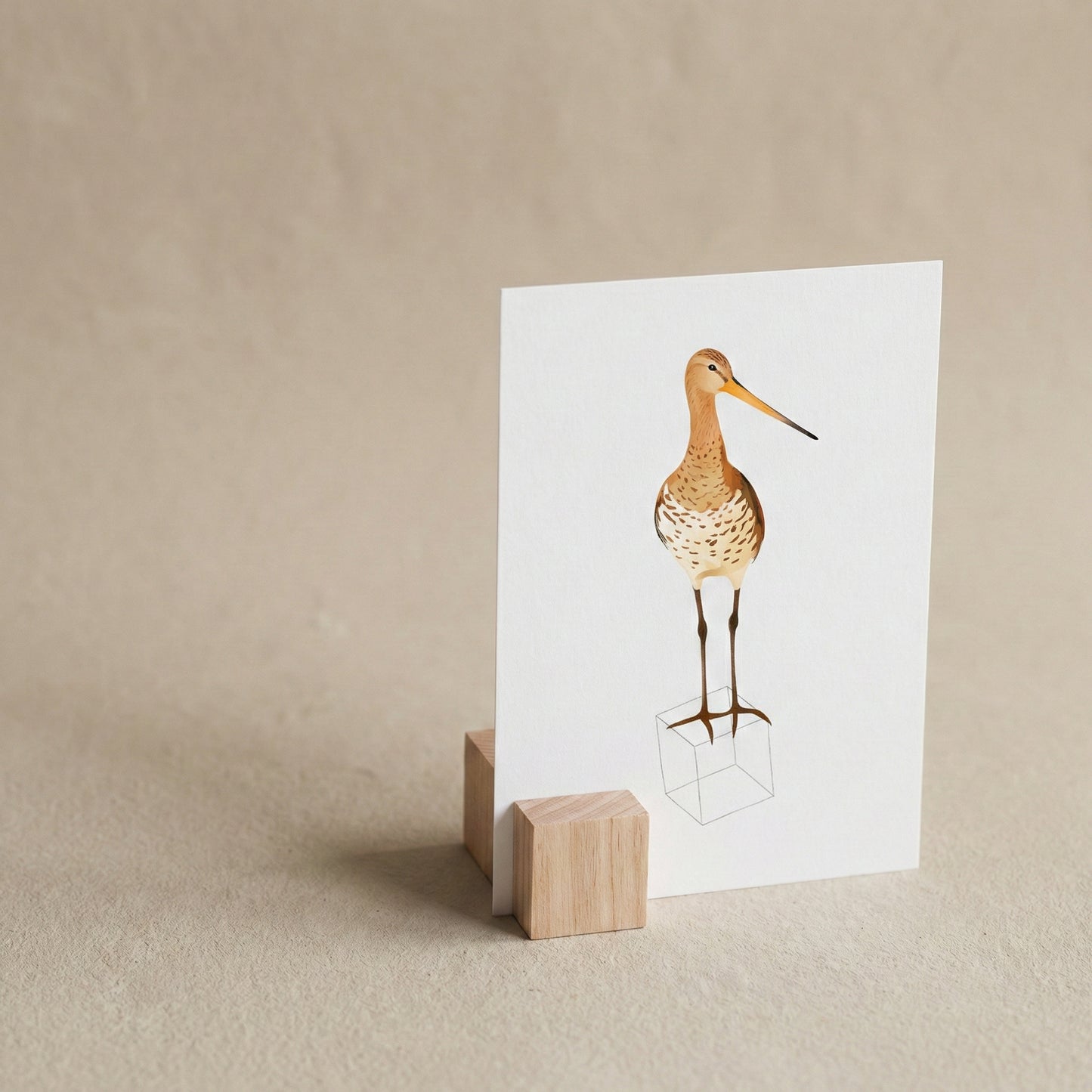 Hold It beech wood photo and card stand displaying a postcard print, showing natural wood grain and precise card slot, handcrafted in the Netherlands, from WILLAGE