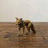 The Keen Fox miniature brass fox figurine in crouched alert pose with head lowered, solid brass with aged patina, from WILLAGE Tiny Objects collection