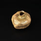 Pewter pomegranate keepsake box with antique brass finish, lid removed to show the smooth hollow interior
