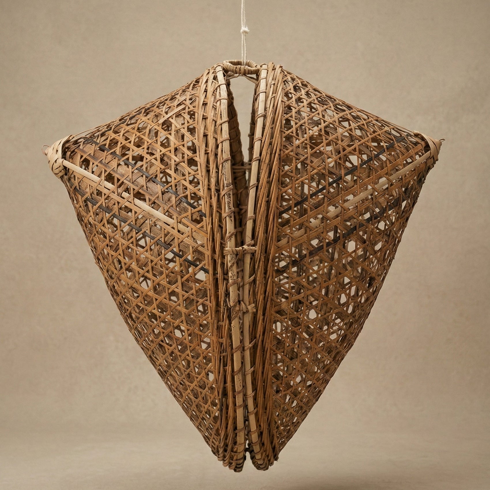 The Knup ancestral bamboo canopy lampshade showing intricate hand-woven lattice pattern, made by Khasi weavers in Meghalaya India, from WILLAGE