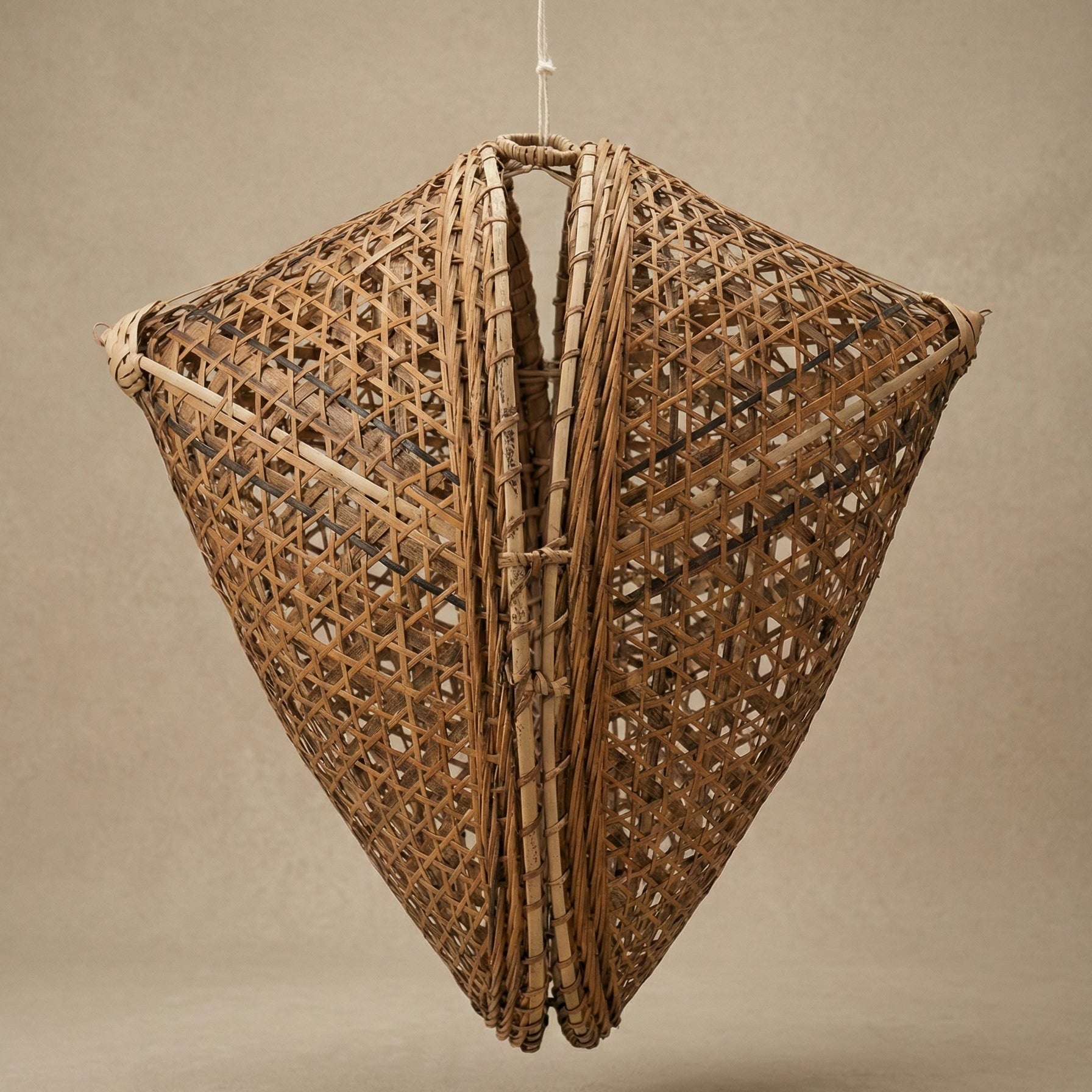 The Knup ancestral bamboo canopy lampshade showing intricate hand-woven lattice pattern, made by Khasi weavers in Meghalaya India, from WILLAGE