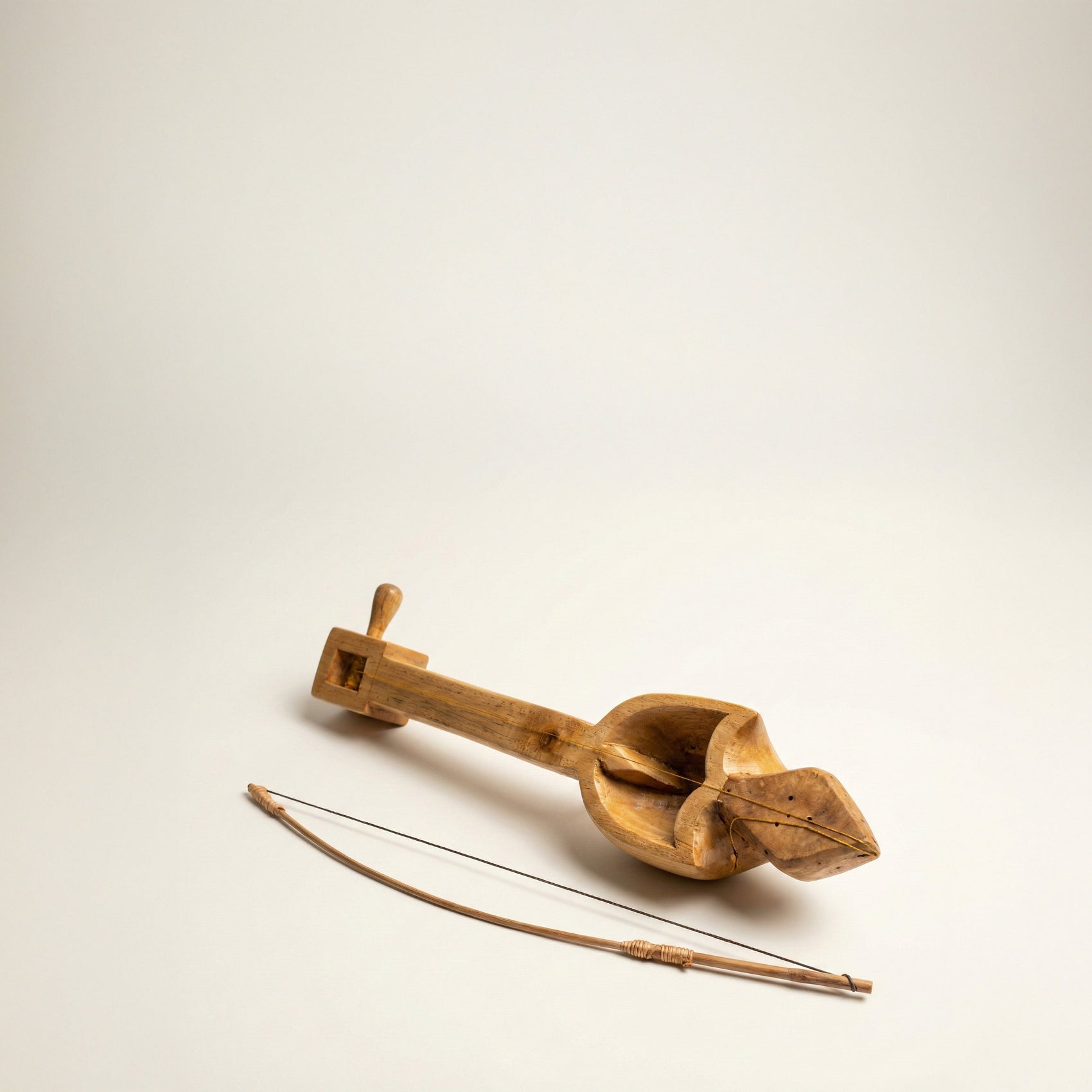 The Listening String hand-carved Khasi folk instrument with rounded body and short neck, carved by Rani Maring in Pahambir village, Meghalaya India, from WILLAGE