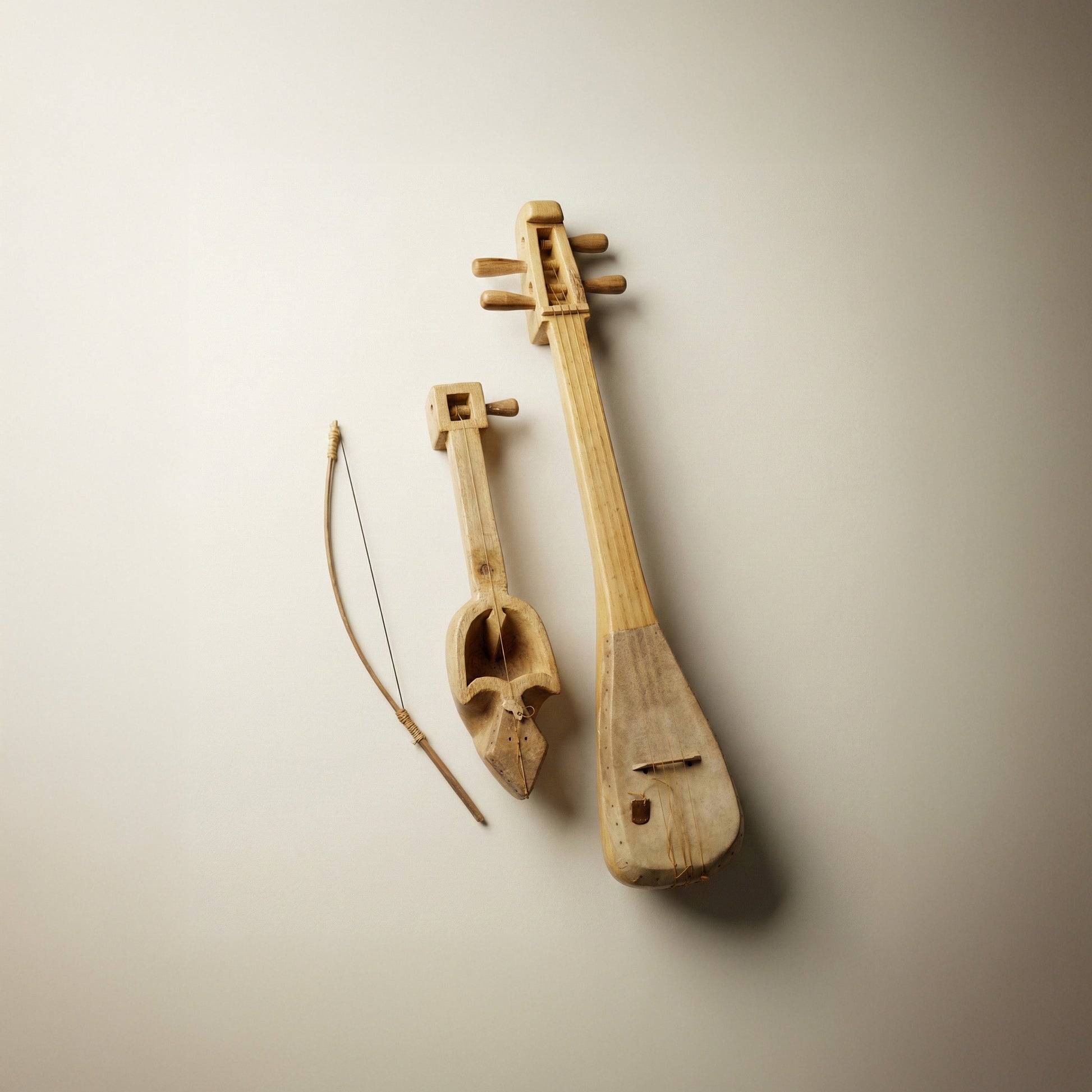 The Long Voice folk lute showing hand-carved wood grain and stretched skin soundboard detail