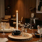 Longpi chamberstick candle holders shown on a dining table in a warm home setting