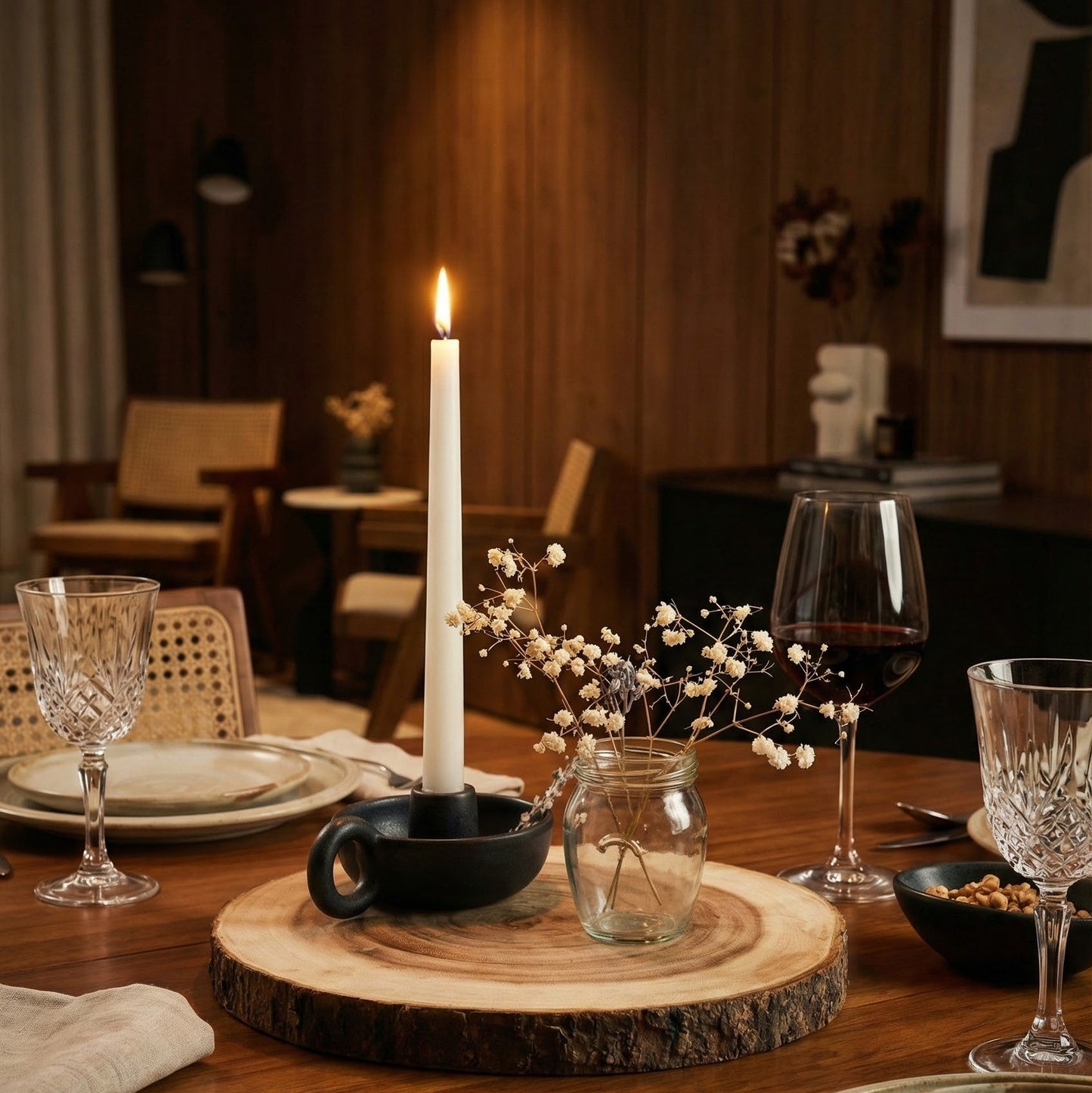 Longpi chamberstick candle holders shown on a dining table in a warm home setting