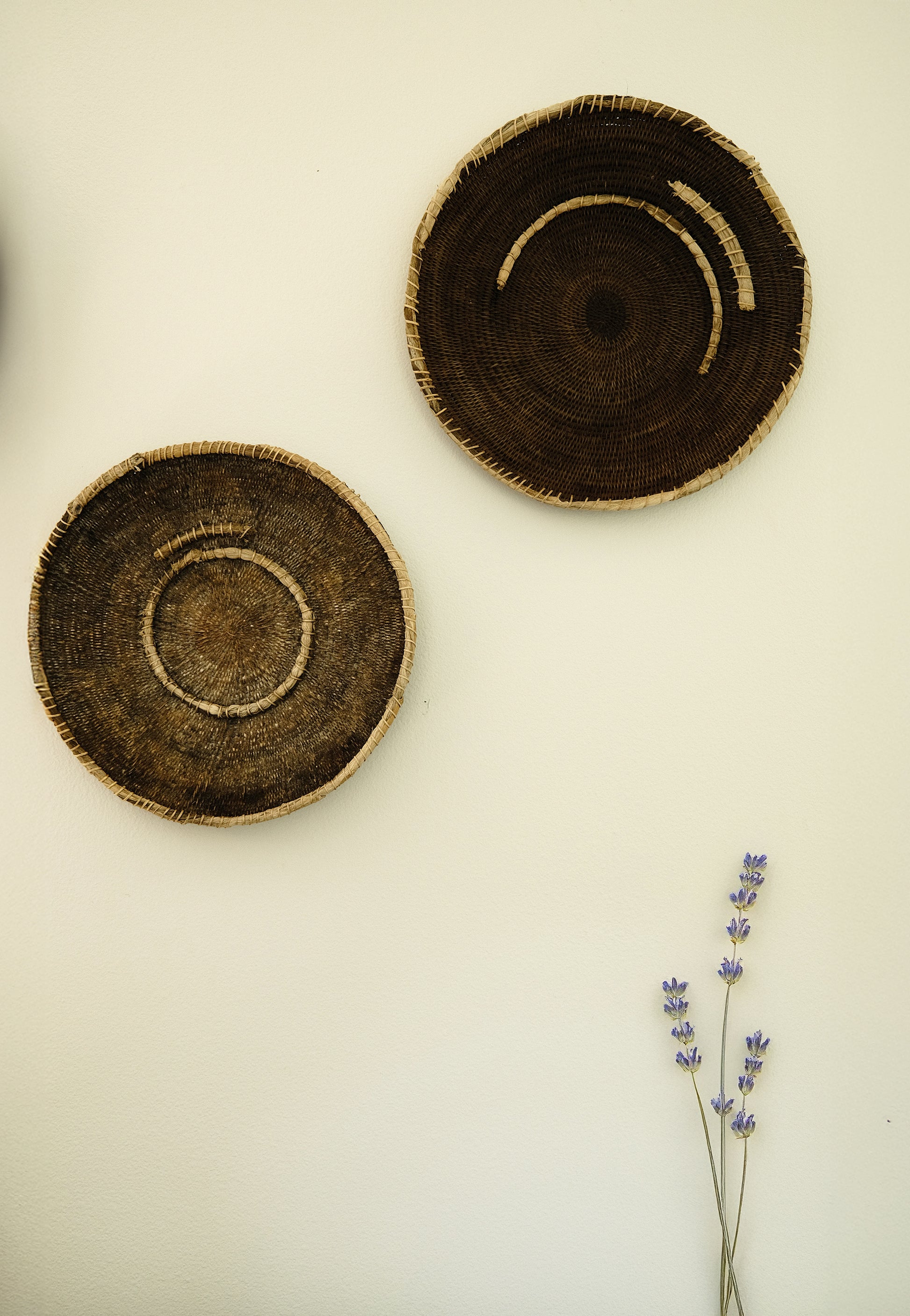 Vintage Makenge basket with geometric pattern in brown and cream, handwoven in Zambia