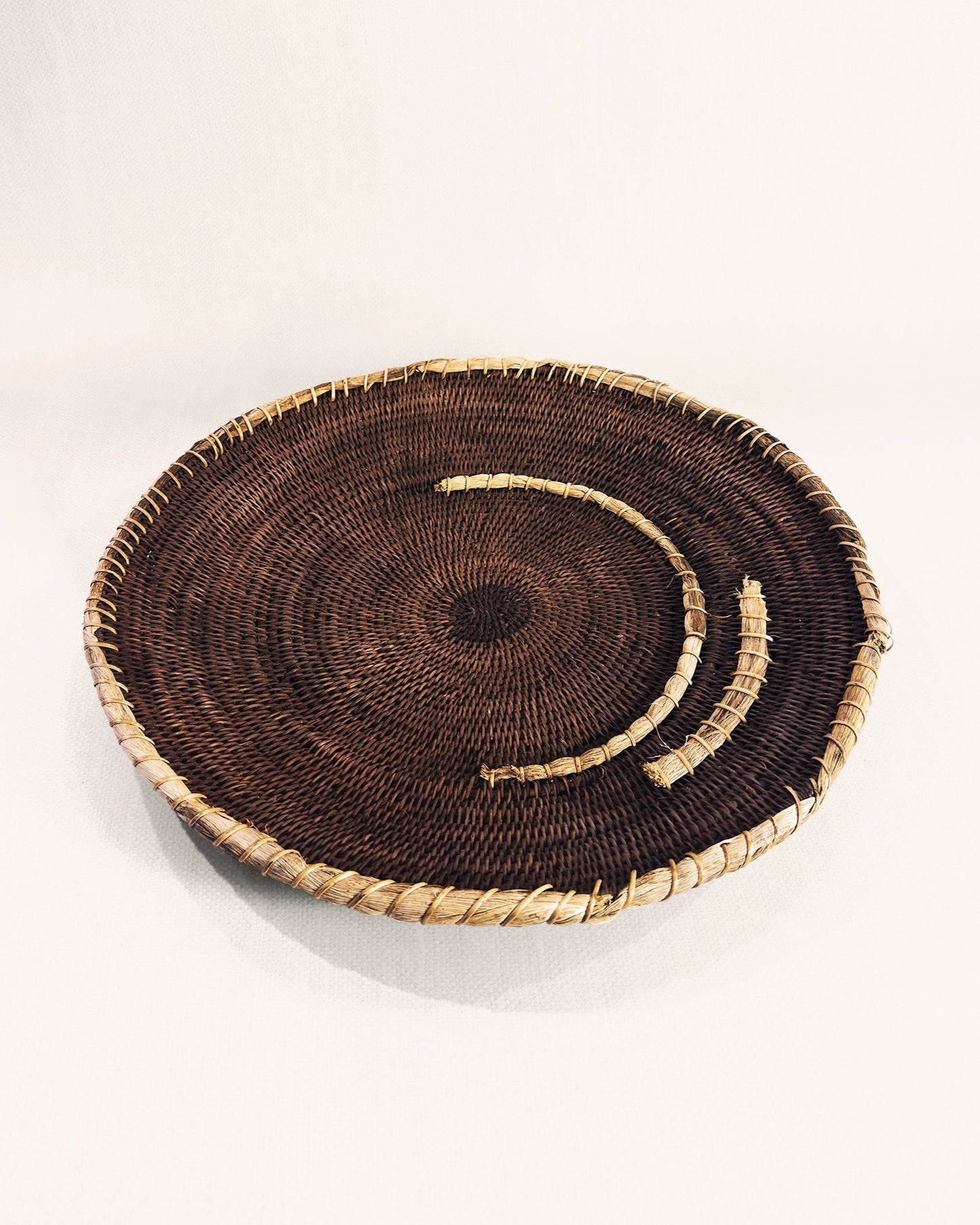 Vintage Zambian Makenge basket showing Makenge bush root dye pattern, traditional Mbunda craft