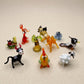 Alternate view of The Wild Ones miniature glass figurine set showing all 10 pieces