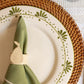 Hand-painted Portuguese dinner plate with olive branch motif styled with fresh pear, from Raquel Souza studio
