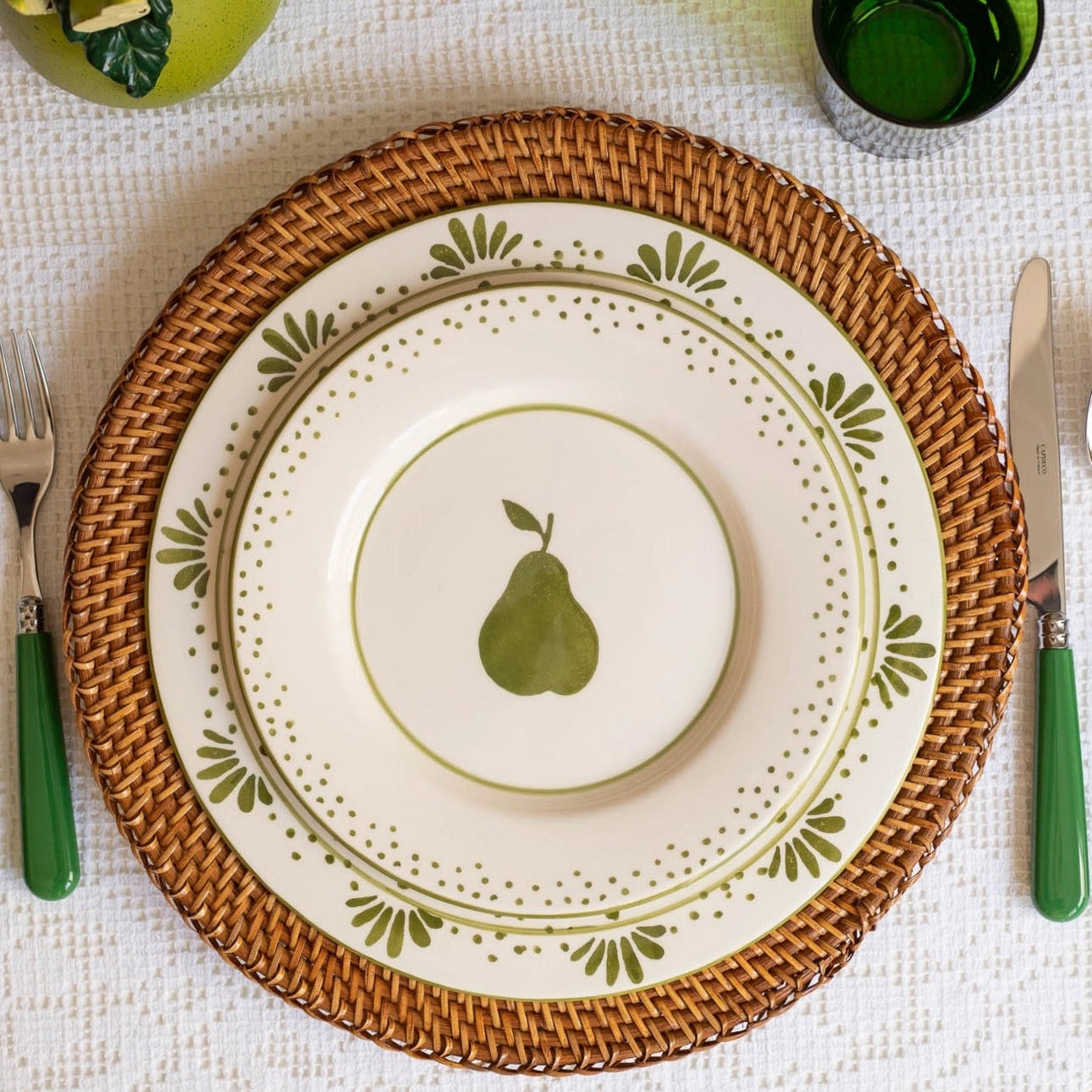 Four Olive Bloom dinner plates showing green floral pattern, hand-painted ceramic tableware from Portugal