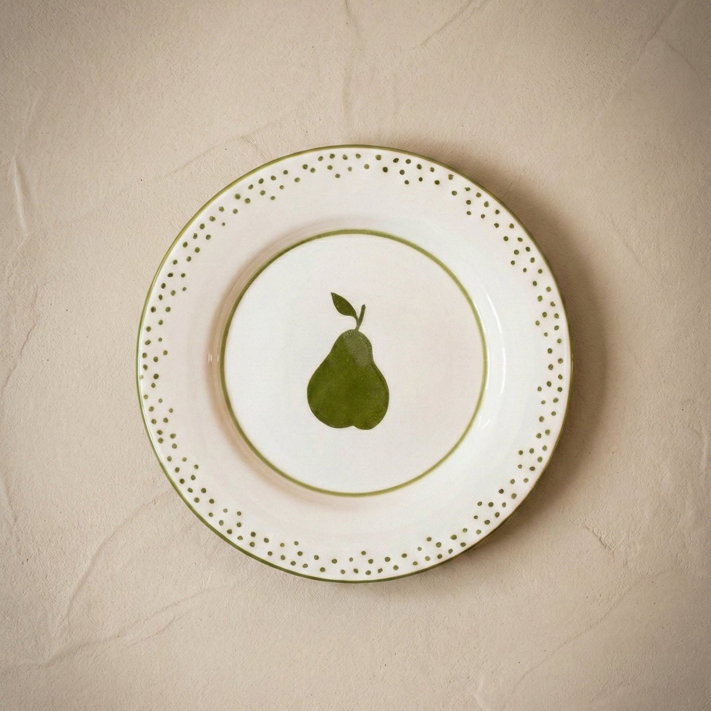 Pear hand-painted ceramic dessert plate with green pear motif, handcrafted by Raquel Souza in Portugal, from WILLAGE