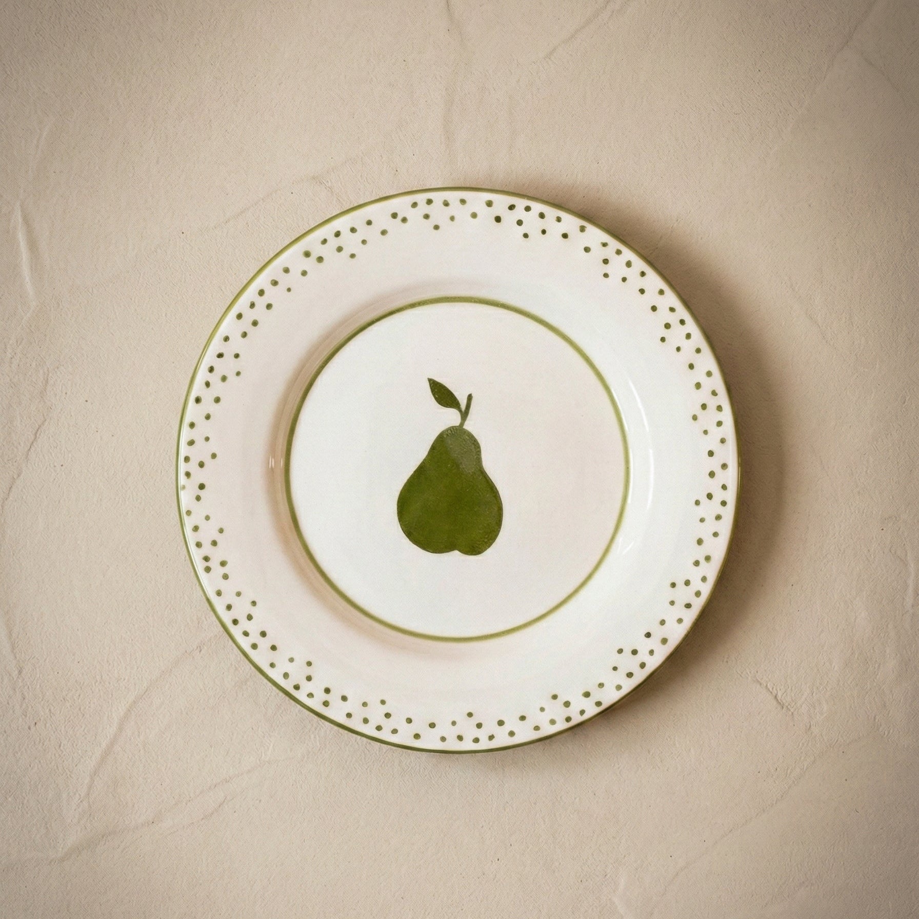 Pear hand-painted ceramic dessert plate with green pear motif, handcrafted by Raquel Souza in Portugal, from WILLAGE