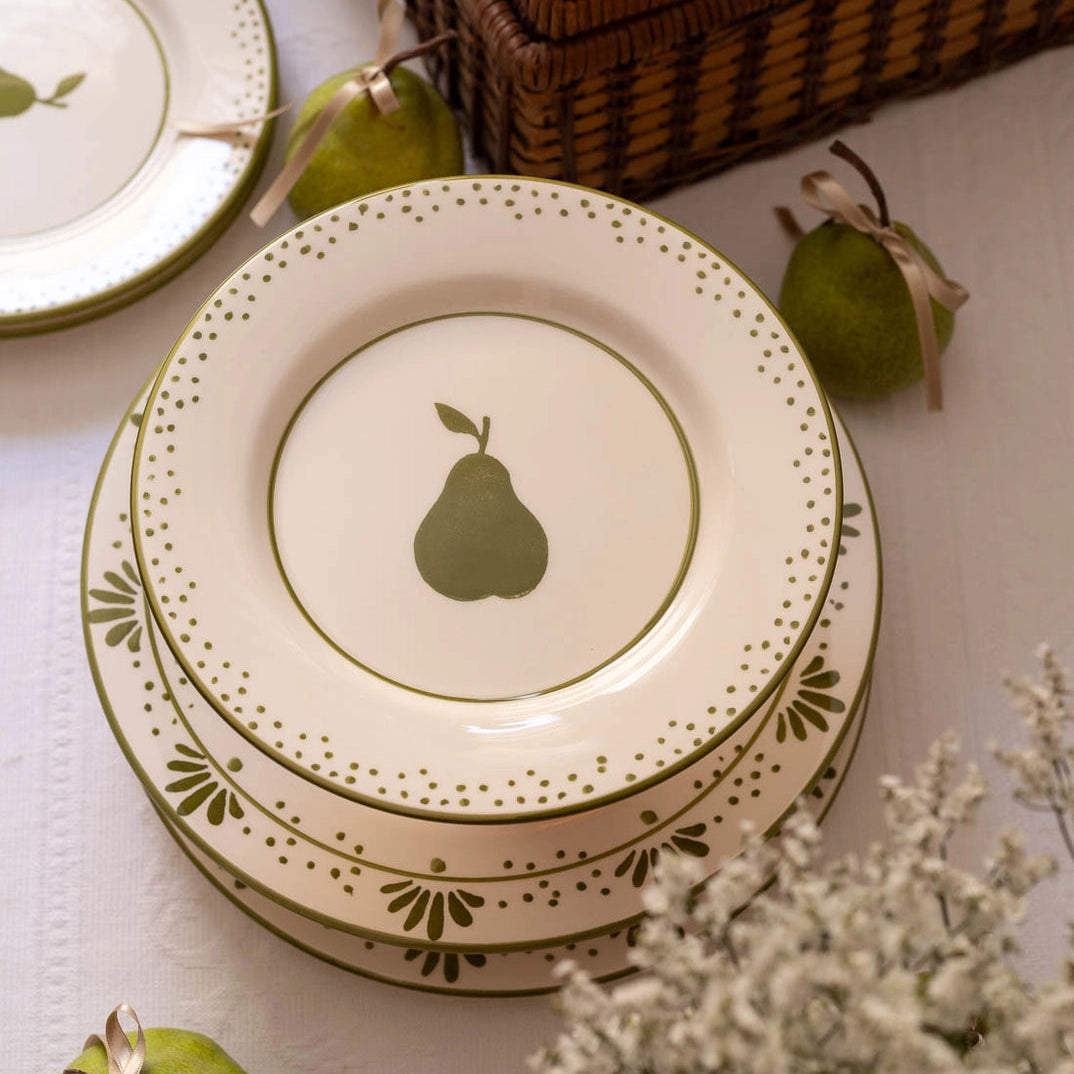 Pear dessert plates styled with dried flowers and fresh pear, hand-painted Portuguese ceramic tableware