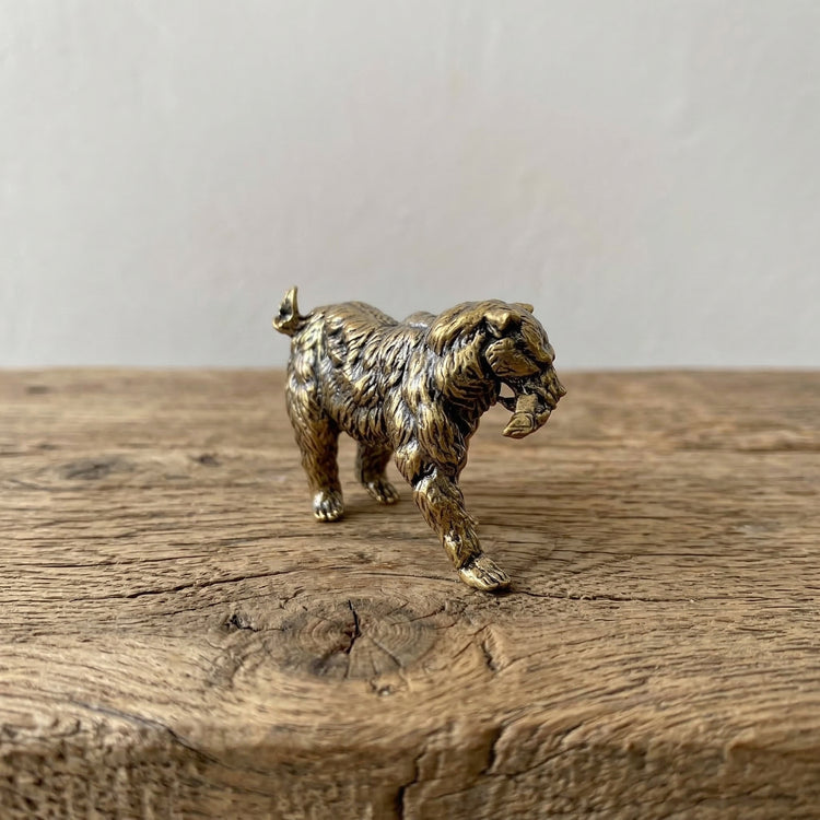 The Resilient Provider miniature brass polar bear carrying a fish, showing detailed fur texture and warm aged patina, from the WILLAGE Tiny Objects collection