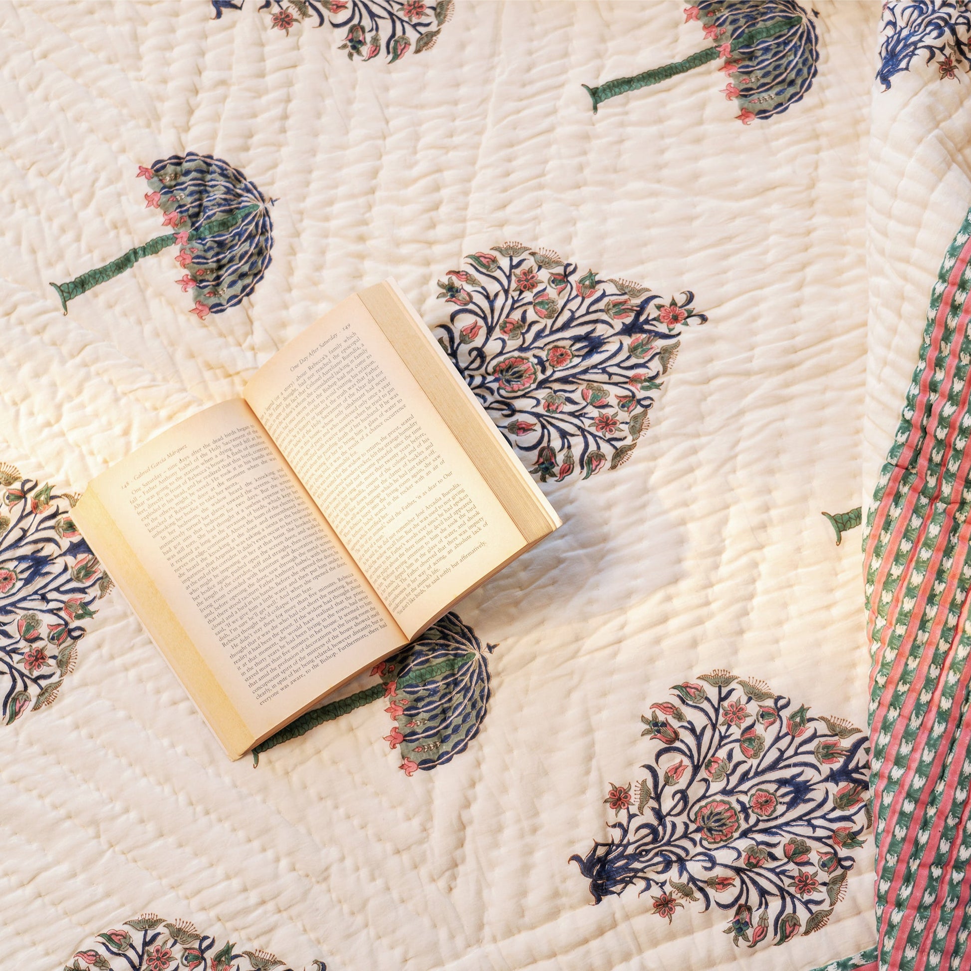 Close-up of hand block-printed umbrella pattern on pure cotton quilt, handcrafted in Jaipur India