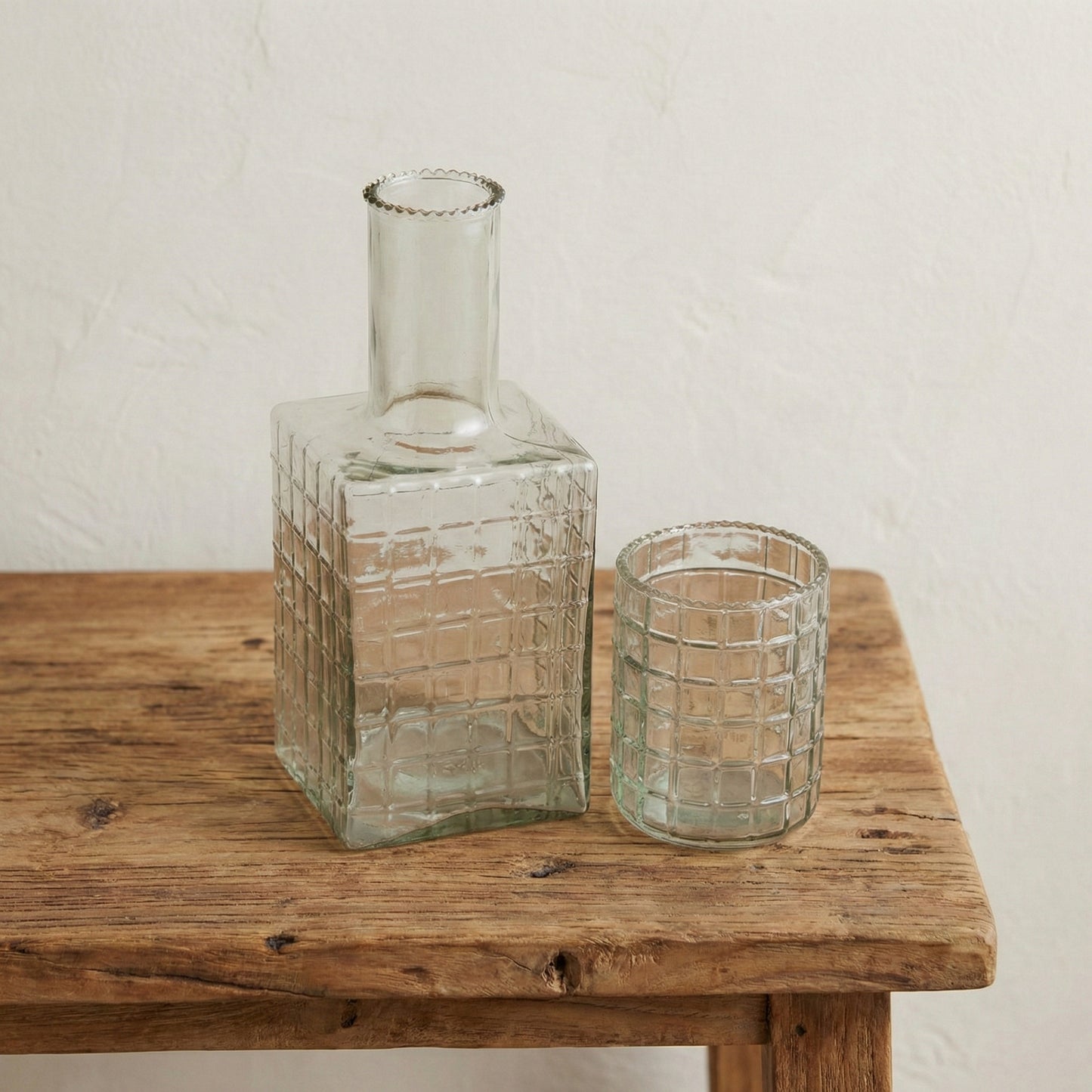 Ruffle glass bedside carafe and tumbler set showing undulating ribbed texture on clear handblown glass, handcrafted in India, from WILLAGE