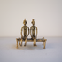 The Seated Companions Dhokra metal sculpture of two elongated seated figures, lost-wax cast with visible wax-strand texture, from WILLAGE