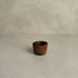 Sung Pinch Pot in black clay showing small hand-formed vessel with unglazed surface, Lyrnai pottery from Meghalaya India, from WILLAGE