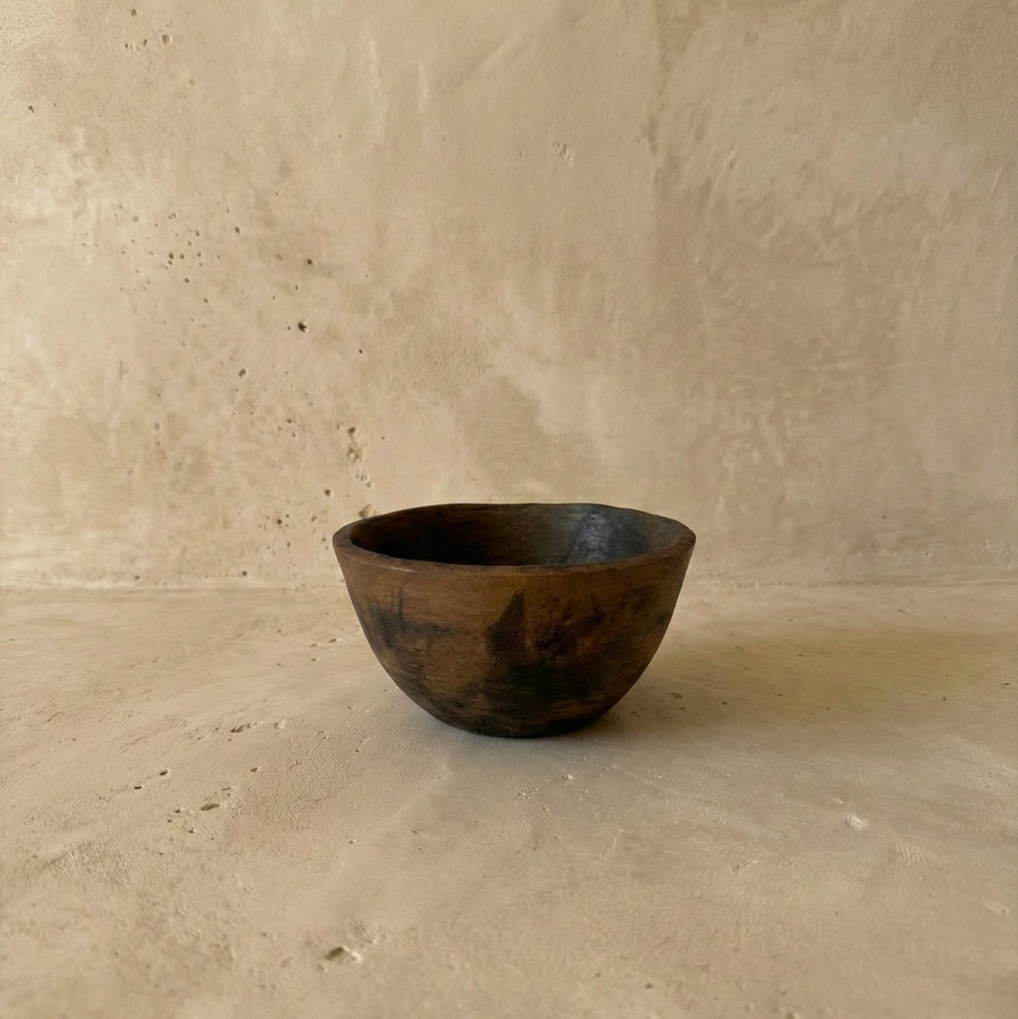Sung Valley handcrafted black clay soup bowl showing deep smoky finish and organic form, burnished with serpentine stone, Lyrnai pottery from Meghalaya India, from WILLAGE
