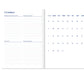 Open diary showing a monthly spread with sections for reflections, focus points, an action list and dreams, beside a month-at-a-glance calendar
