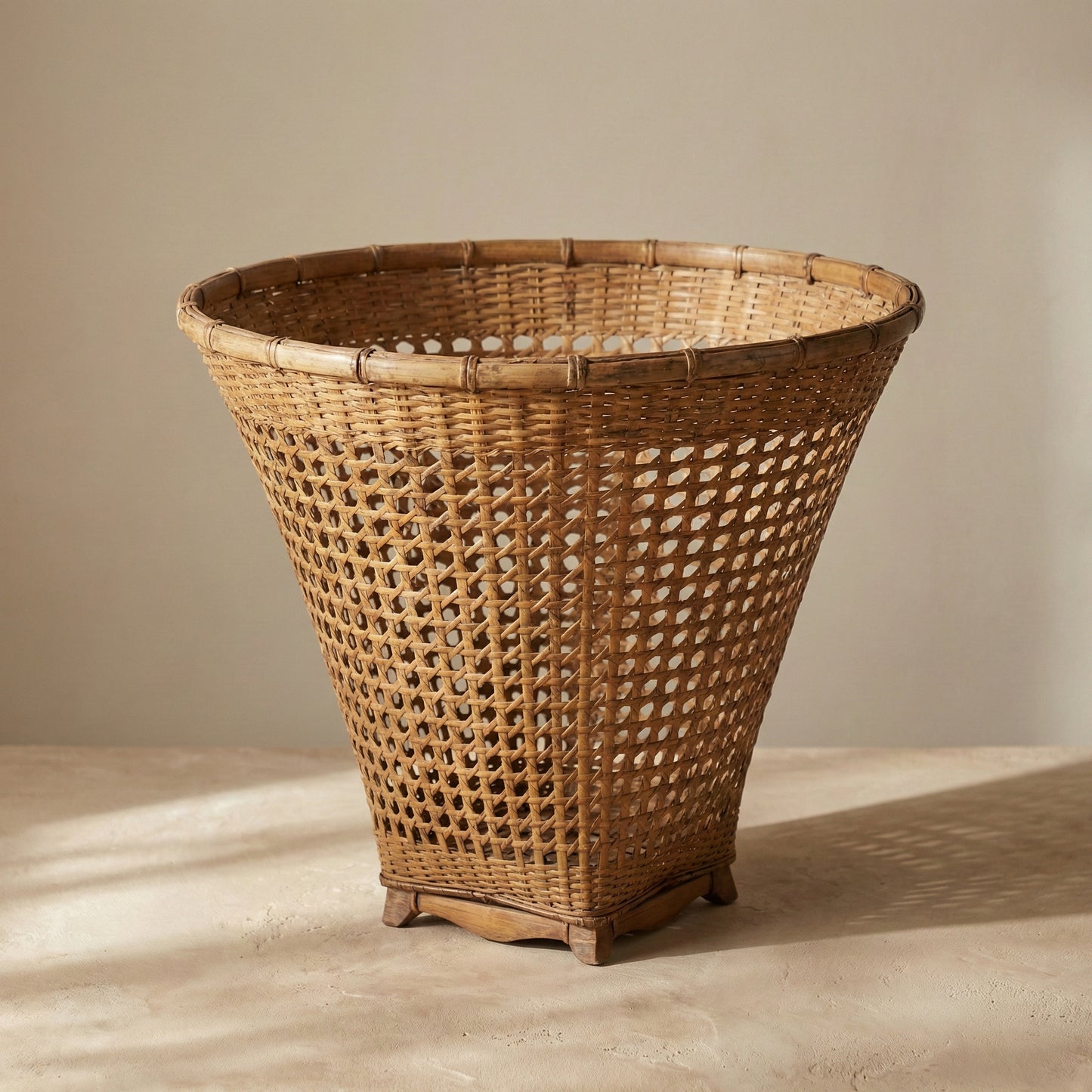 Tapered handwoven cane basket from Assam India, showing bamboo weave pattern, from WILLAGE