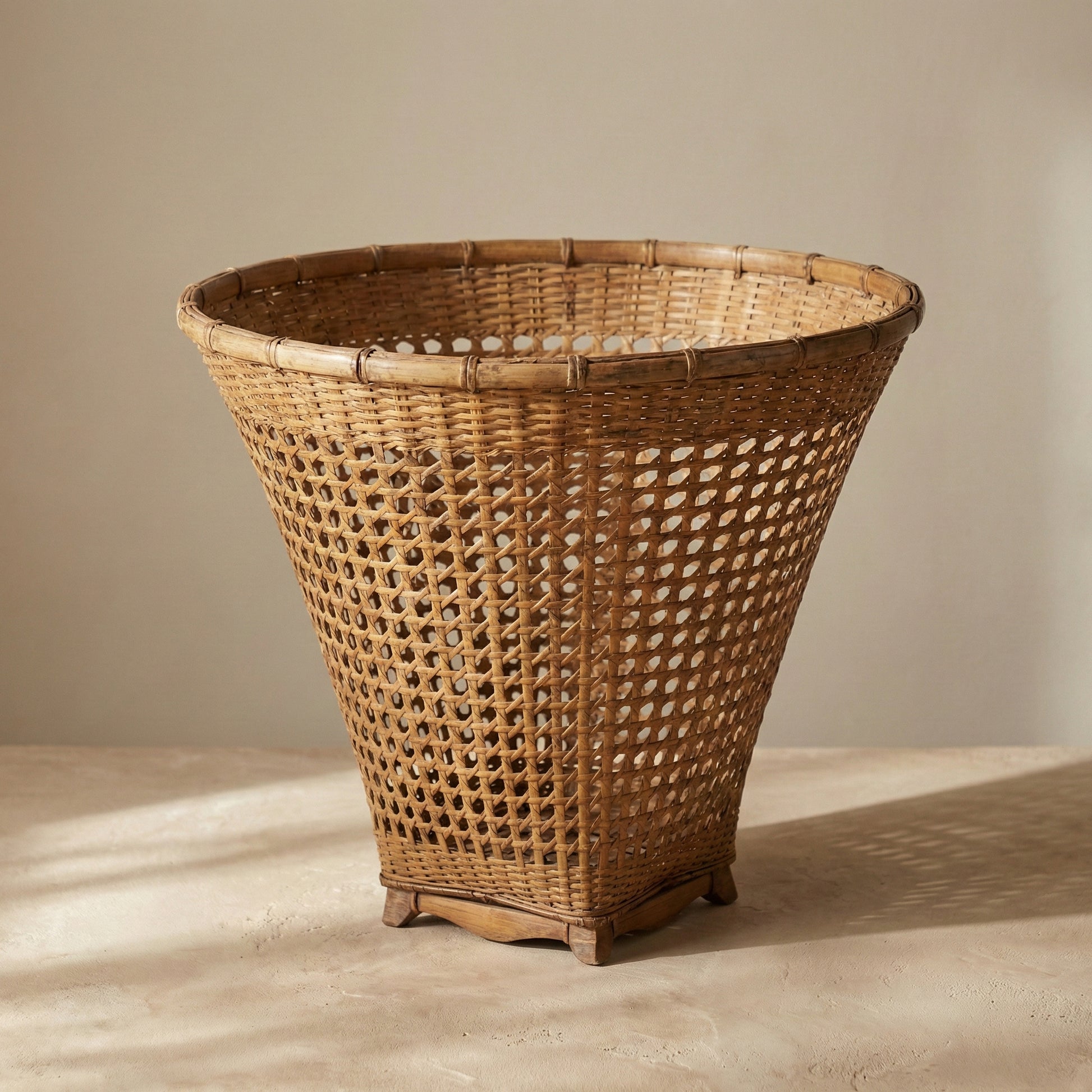 Tapered handwoven cane basket from Assam India, showing bamboo weave pattern, from WILLAGE