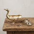 The Wild Goose brass incense burner with an intricate pierced openwork lid, antique gold finish