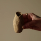 Hand-built bud vase by Conrad & Dina in Canada, raw clay sculpture
