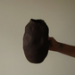Hand-built clay vessel by Conrad & Dina, raw ceramic sculpture from Canada