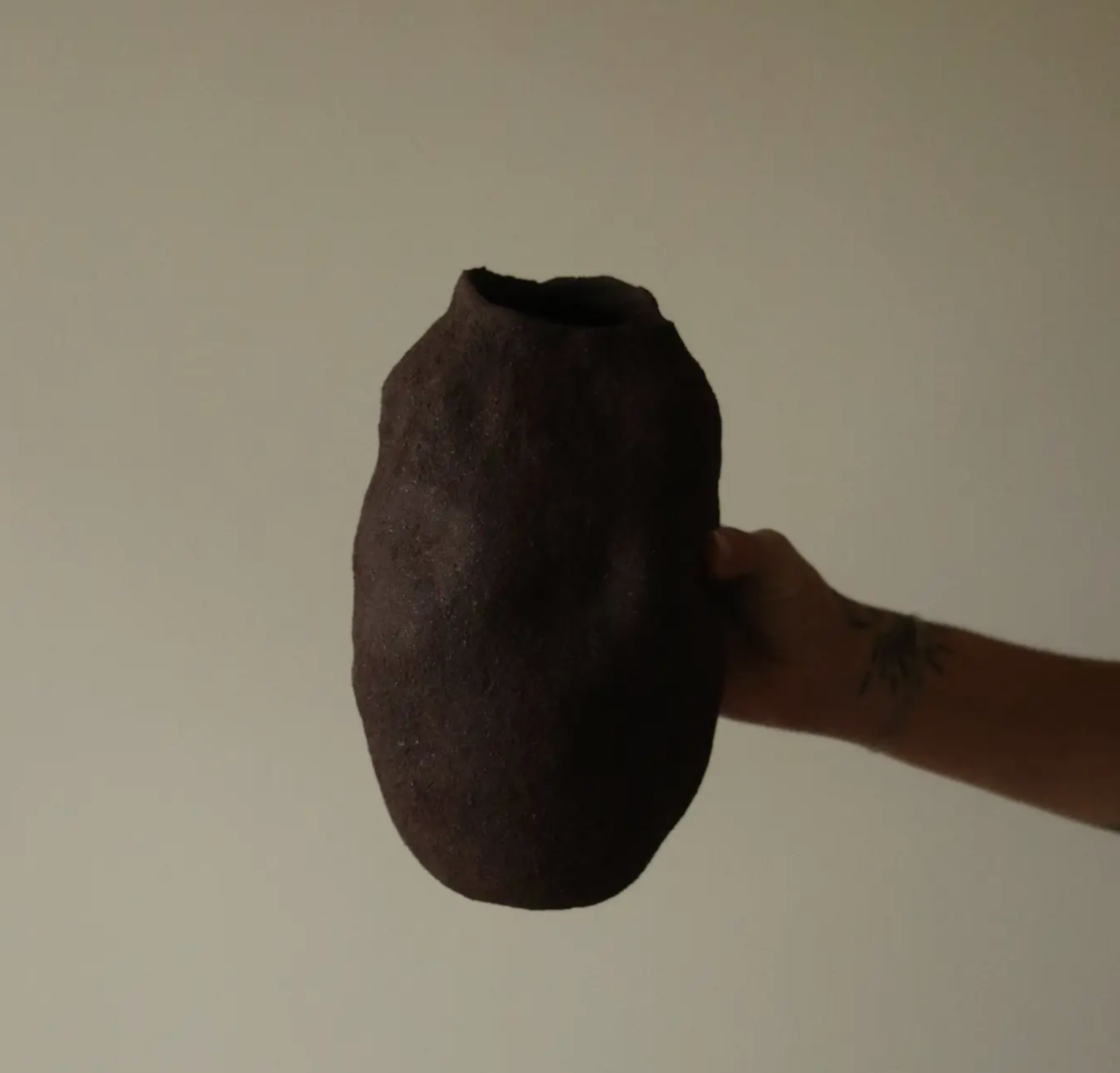 Hand-built clay vessel by Conrad & Dina, raw ceramic sculpture from Canada