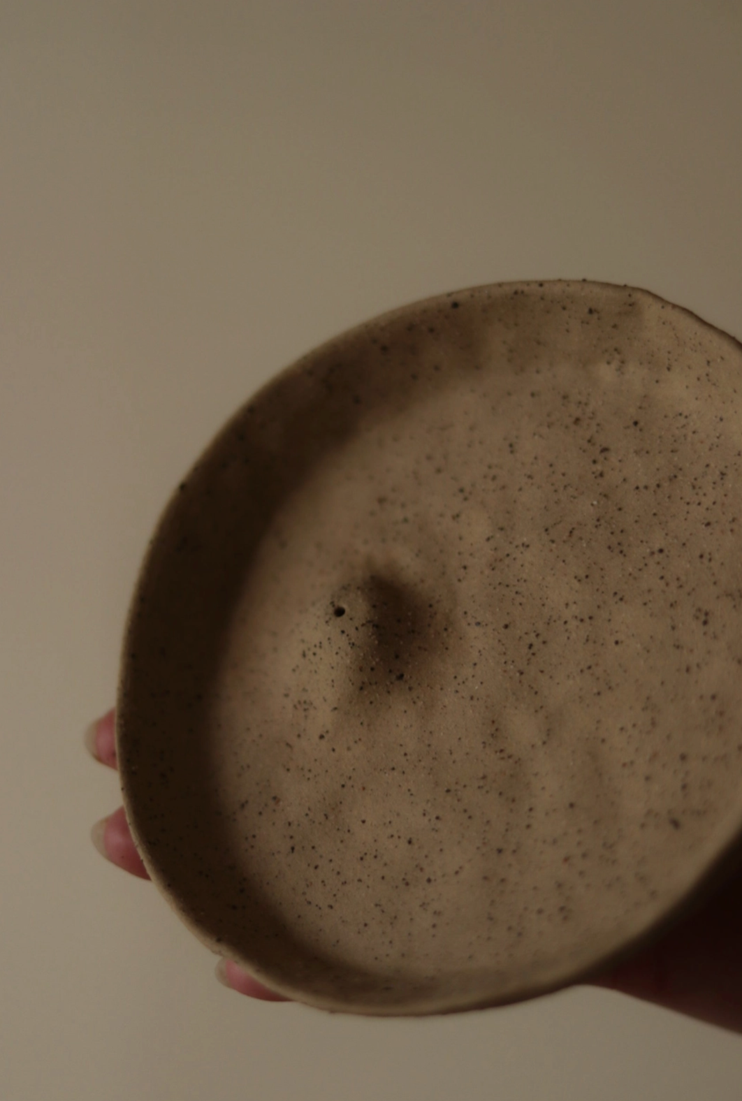 Earth-toned incense holder crafted from natural gathered materials