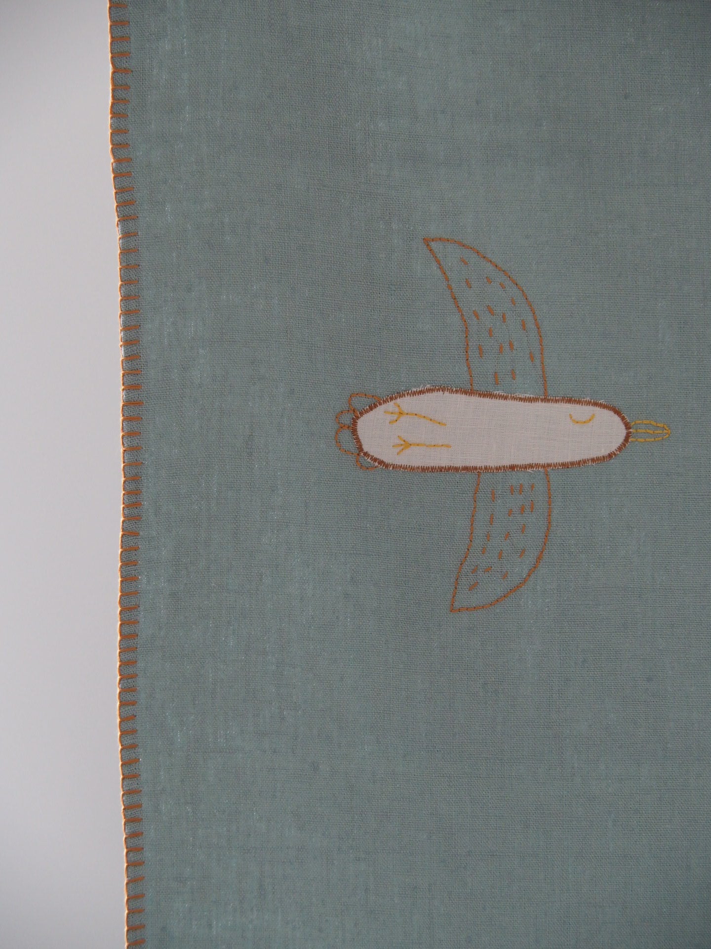 Handwoven organic linen baby blanket dyed with natural plant-based pigments.