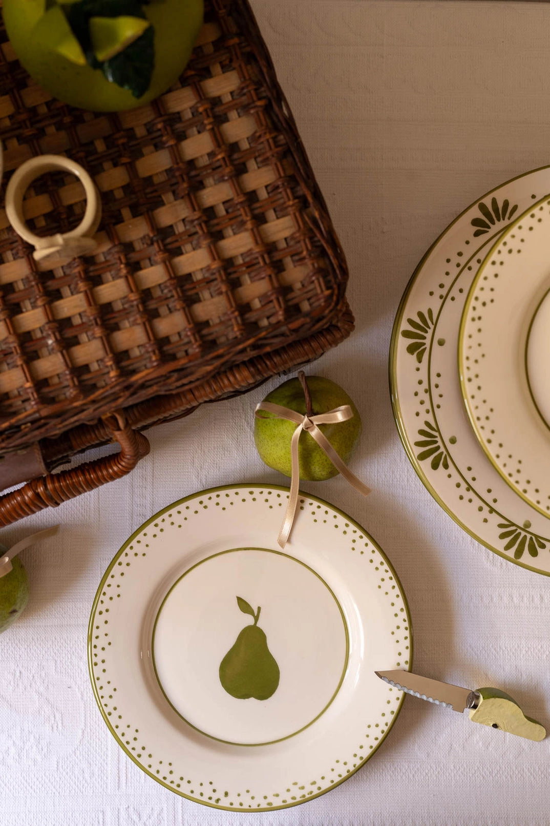 Artisan pear plate with vintage polka dot rim, handmade in Portugal